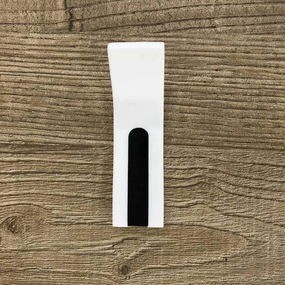 Wieszak ścienny z Corianu z białą lub czarną wkładką, 3 sztuki - Appiccio Viadurini