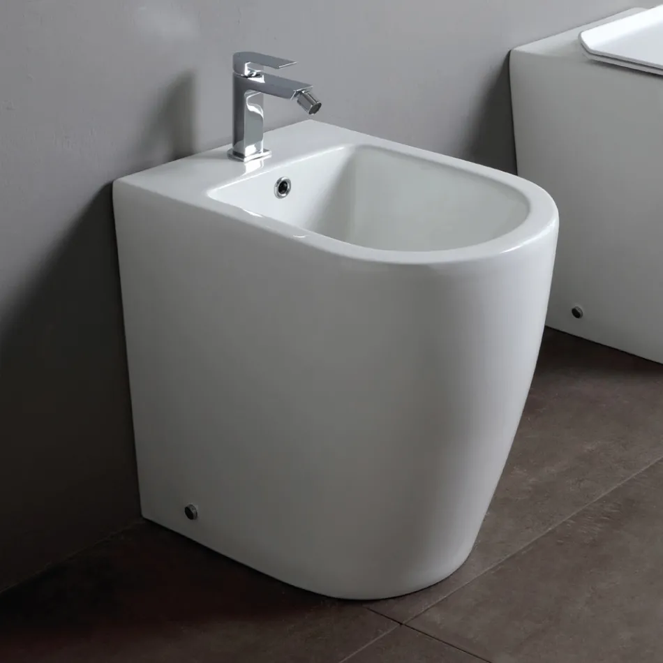 Bidet jednootworowy montowany na podłodze z technologią bezkołnierzową w kolorze białej ceramiki - Oleandro  Viadurini