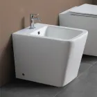 Bidet jednootworowy montowany na podłodze, z białej ceramiki, o eleganckim, nowoczesnym wzornictwie – Giunco Viadurini