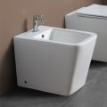 Bidet jednootworowy montowany na podłodze, z białej ceramiki, o eleganckim, nowoczesnym wzornictwie – Giunco