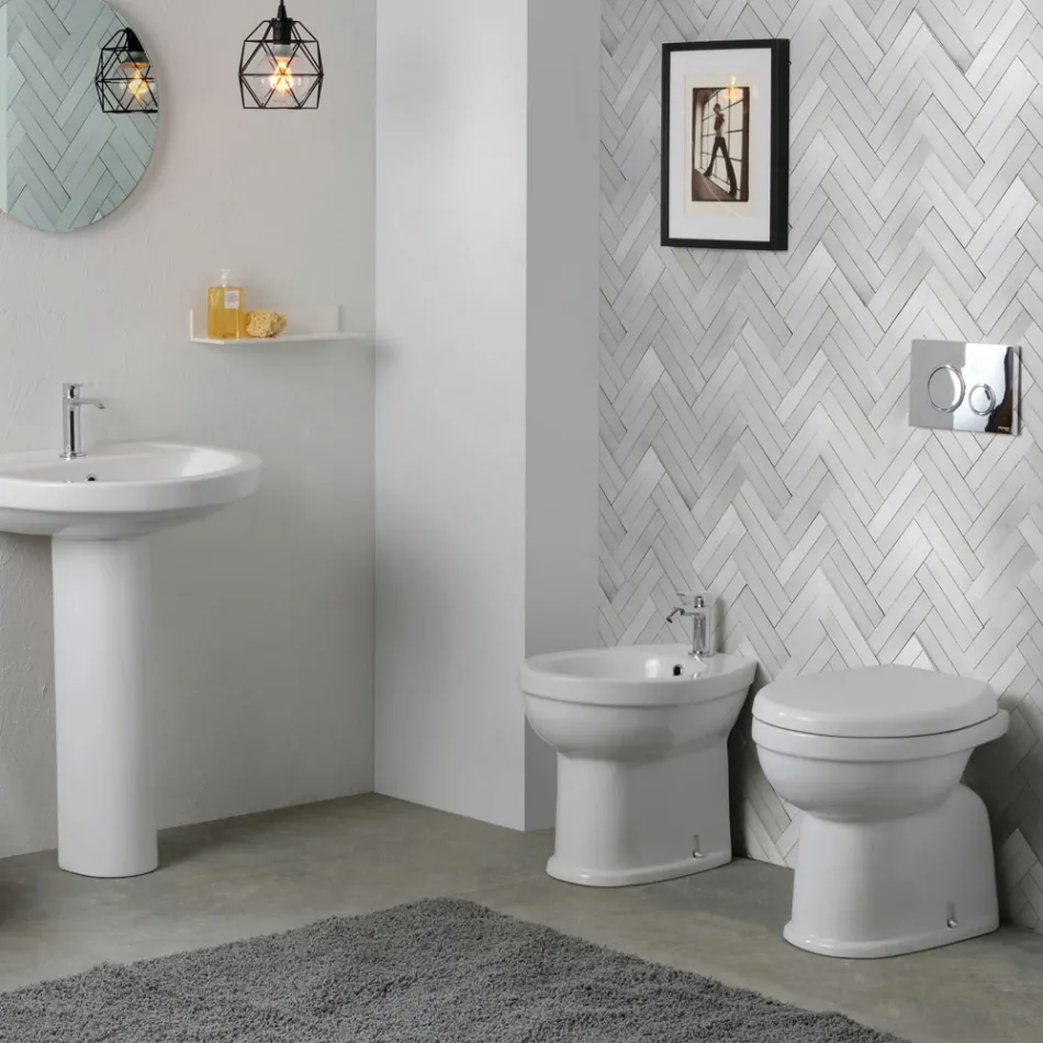 Bidet jednootworowy montowany na podłodze, z białej ceramiki, o eleganckim, nowoczesnym wzornictwie – Silica Viadurini