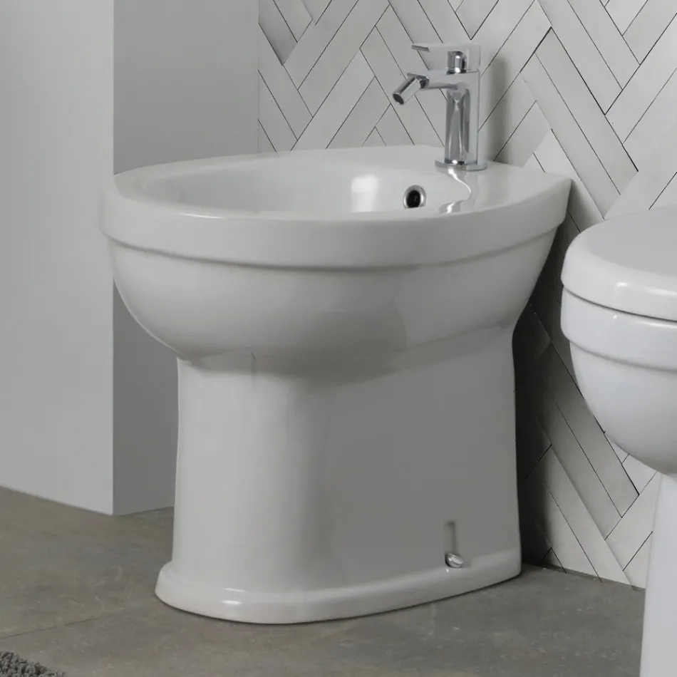 Bidet jednootworowy montowany na podłodze, z białej ceramiki, o eleganckim, nowoczesnym wzornictwie – Silica Viadurini