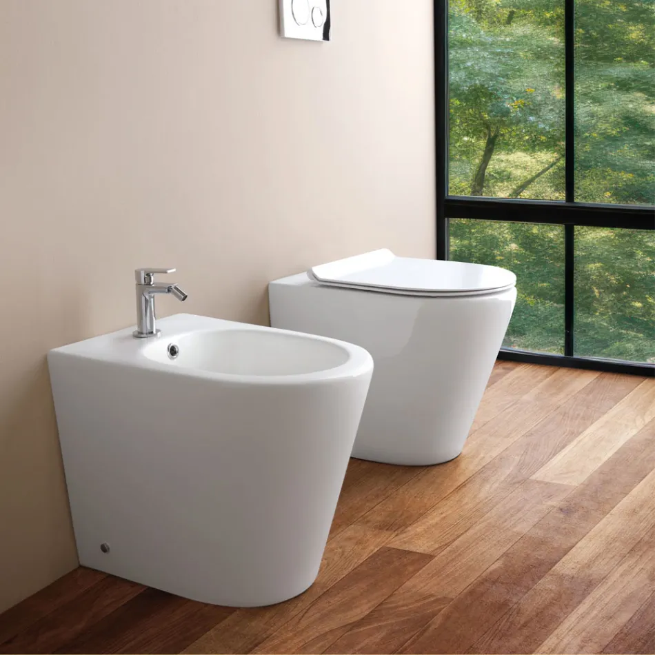 Bidet jednootworowy montowany na podłodze, biały, ceramiczny, o nowoczesnym wzornictwie - Ginepro Viadurini