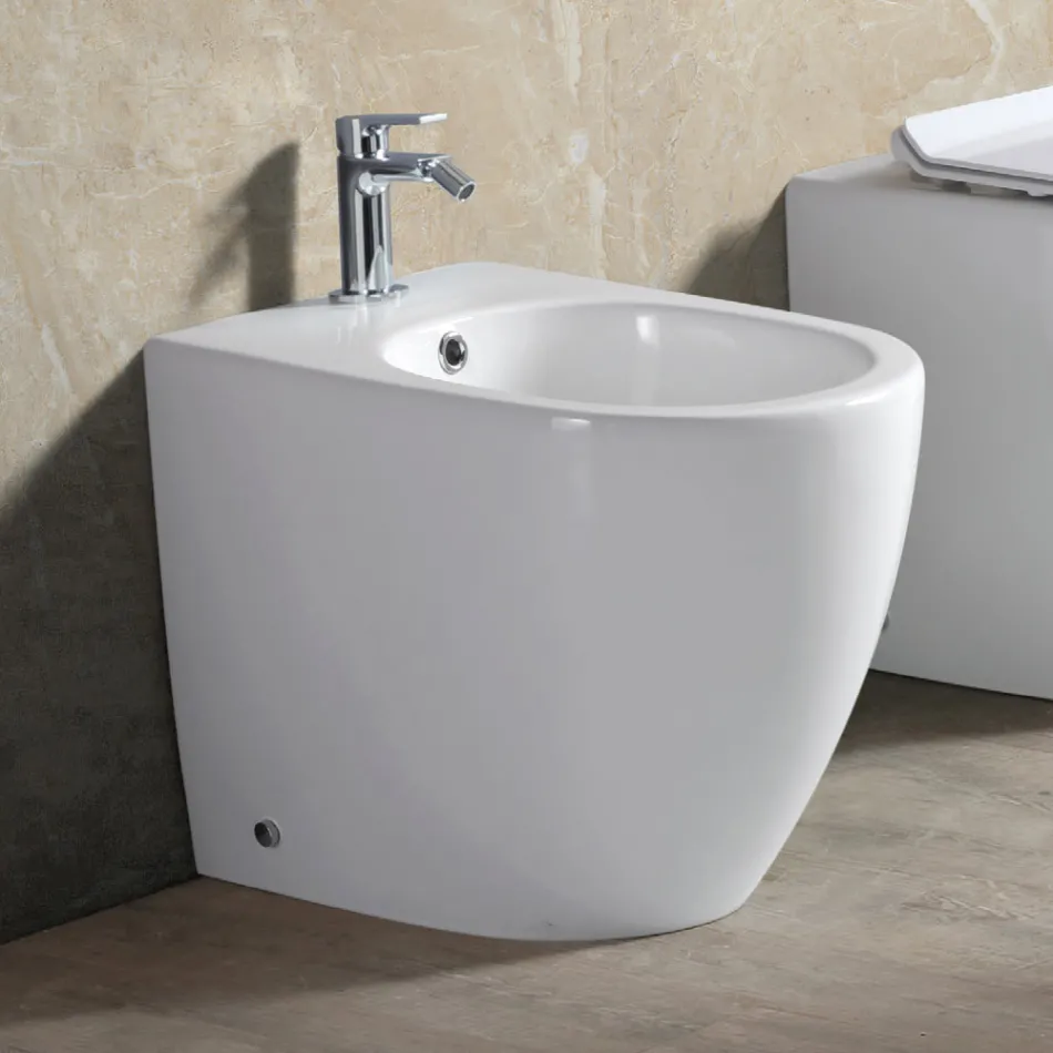 Bidet stojący Aster z jednym otworem, wykonany z trwałej białej ceramiki o nowoczesnym wzornictwie Viadurini