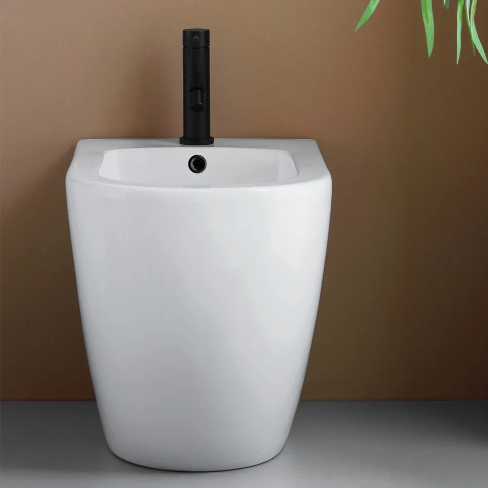 Bidet stojący z jednym otworem, wykonany z trwałej białej ceramiki o nowoczesnym wzornictwie - Olmo Viadurini