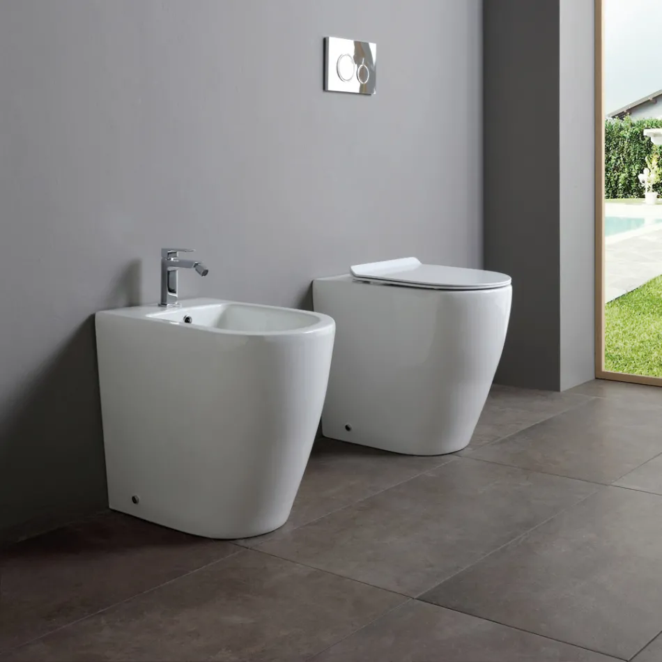 Bidet jednootworowy z przesuniętym odpływem, ceramiczny, o nowoczesnym designie - Oleandro  Viadurini