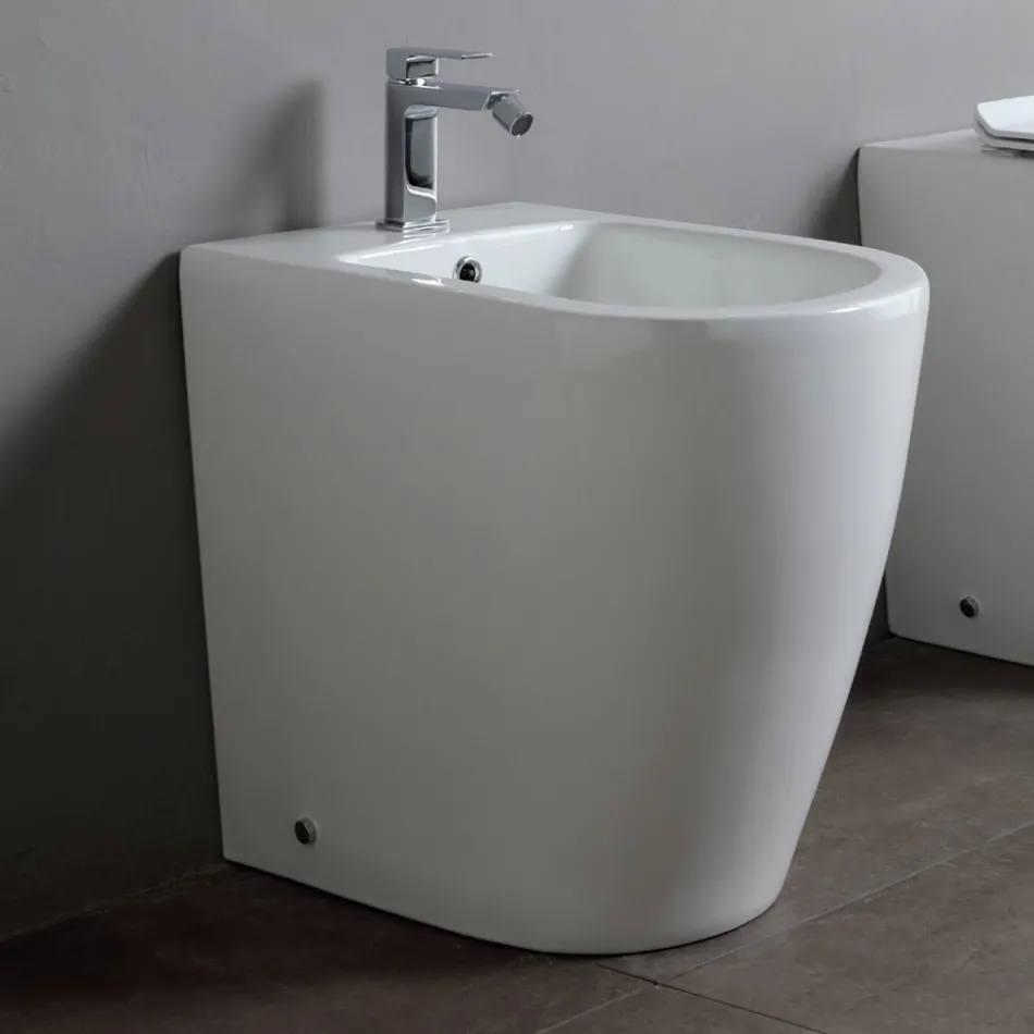 Bidet jednootworowy z przesuniętym odpływem, ceramiczny, o nowoczesnym designie - Oleandro  Viadurini