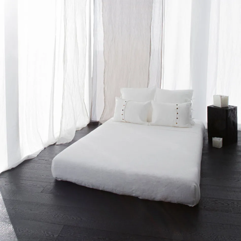 Poszewka na poduszkę w kolorze kredowym lub w stylu retro z kwadratowymi krawatami - Prisco Viadurini