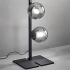 Nowoczesna lampa podłogowa z czarnego lub złotego metalu i dmuchanego szkła - Birga Viadurini