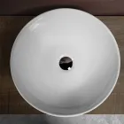 Owalna, pochylona ceramiczna umywalka nablatowa o nowoczesnym designie - Papavero Viadurini