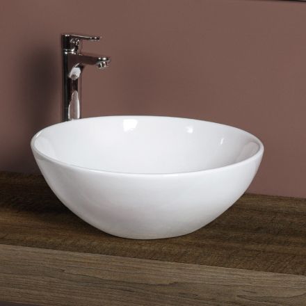 Owalna ceramiczna umywalka blatowa o nowoczesnym designie - Papavero Viadurini