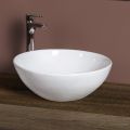 Owalna, pochylona ceramiczna umywalka nablatowa o nowoczesnym designie - Papavero