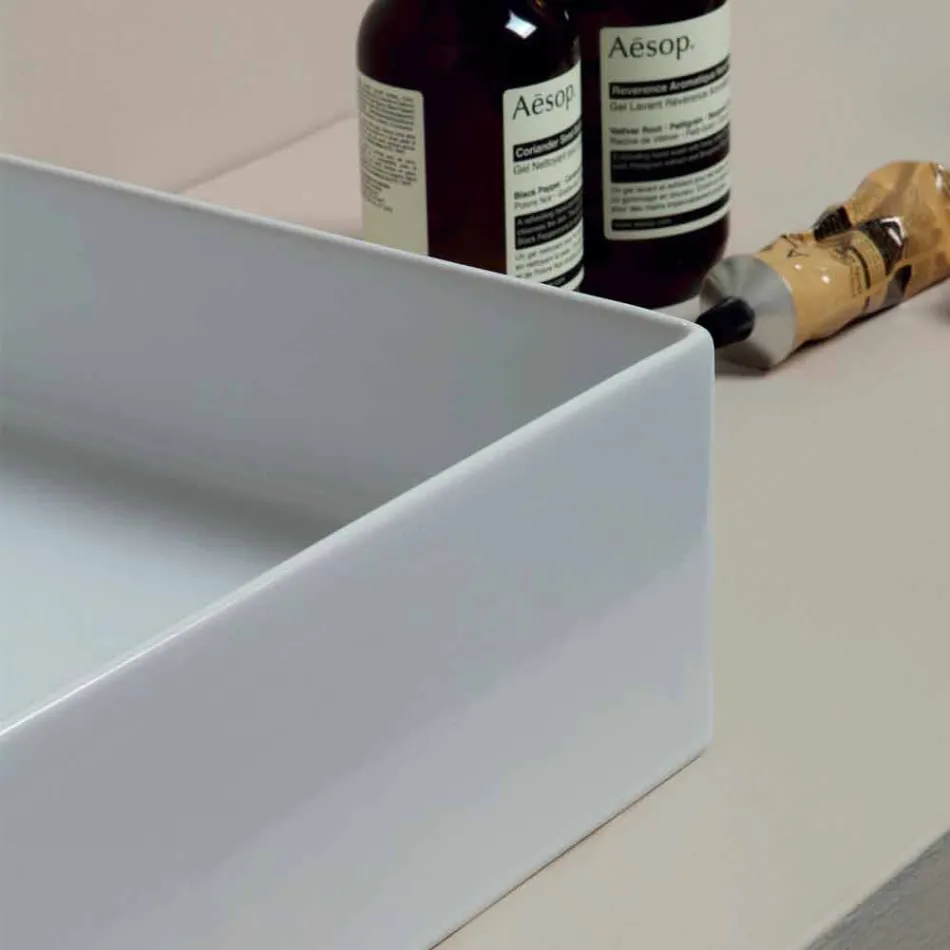 Nowoczesny design stojąca ceramiczna umywalka Sun 60x37, wyprodukowana we Włoszech Viadurini