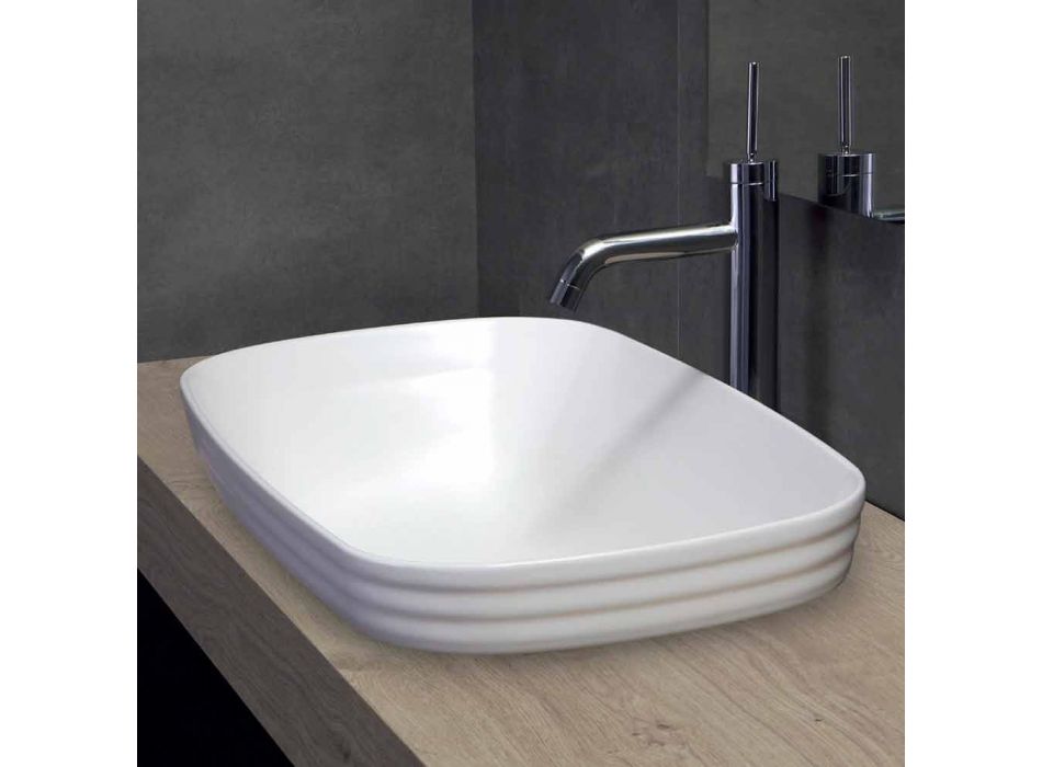 Umywalka częściowo wpuszczana w kolorze białym lub kolorowym ceramiką według projektu Trabia Viadurini