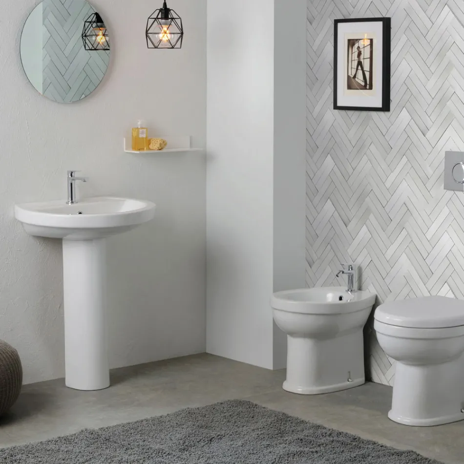 Biała ceramiczna umywalka na postumencie o eleganckim, nowoczesnym wzornictwie – Silica Viadurini
