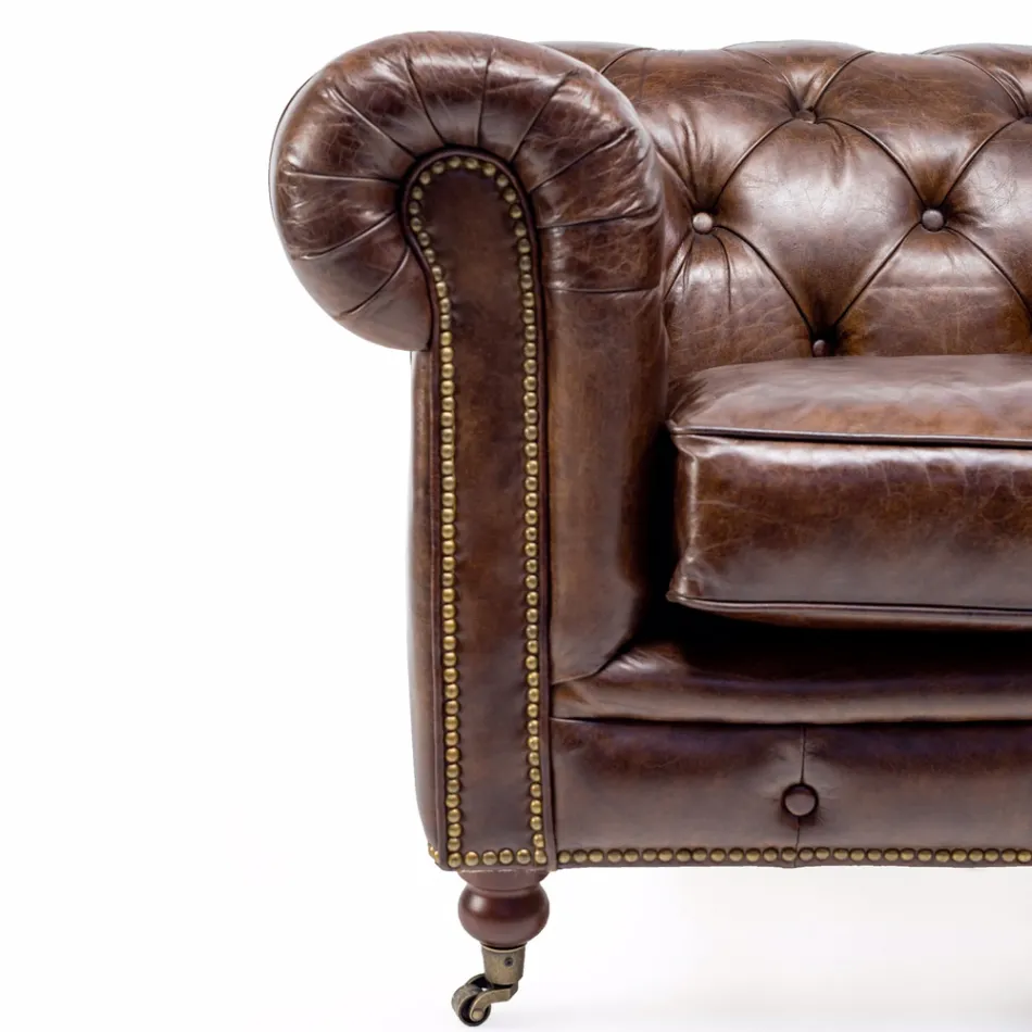 Fotel do salonu ze skóry w stylu vintage z efektem postarzenia z kółkami i podłokietnikami - stempel Viadurini