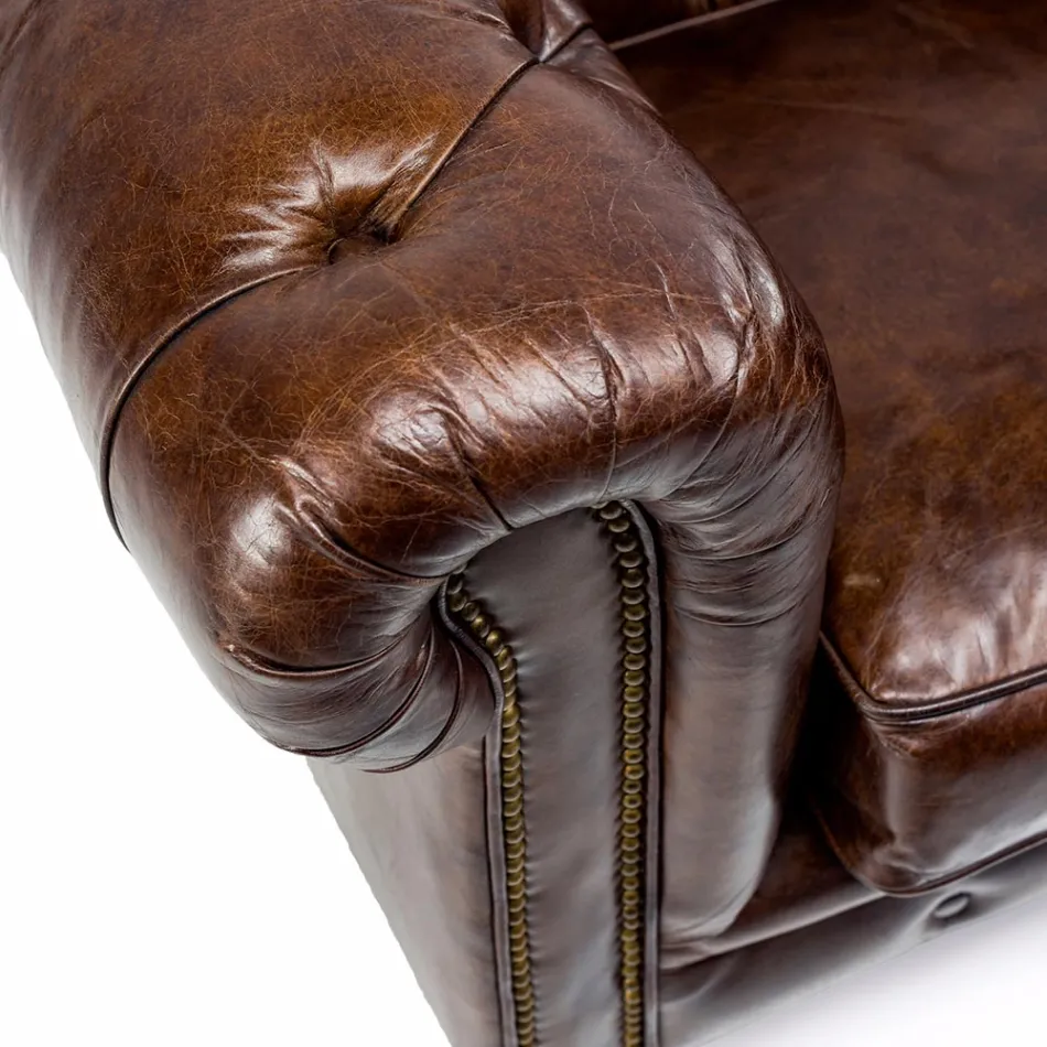Fotel do salonu ze skóry w stylu vintage z efektem postarzenia z kółkami i podłokietnikami - stempel Viadurini