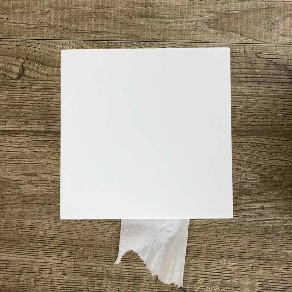 Uchwyt na papier łazienkowy z białego Corianu lub z czarnymi wstawkami Włoski design - Elono Viadurini