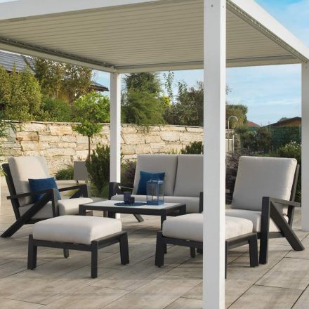 Salon składający się z sofy, stolika kawowego i foteli z podnóżkiem - Tablica ogłoszeń Viadurini