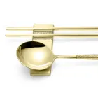 Zestaw składający się z łyżki owoców, pałeczek i podstawki na sztućce z origami - Osaka Viadurini