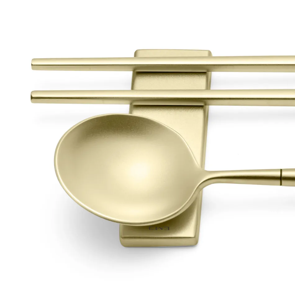 Zestaw składający się z łyżki do owoców, pałeczek i podstawki na sztućce - Osaka Viadurini