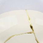 Zaprojektuj okrągłą kieszeń z białej porcelany i złotych liści - Cicatroro Viadurini