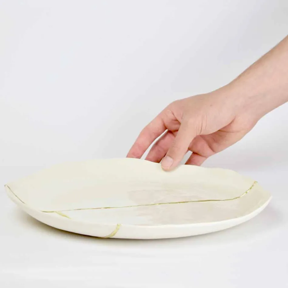 Zaprojektuj okrągłą kieszeń z białej porcelany i złotych liści - Cicatroro Viadurini