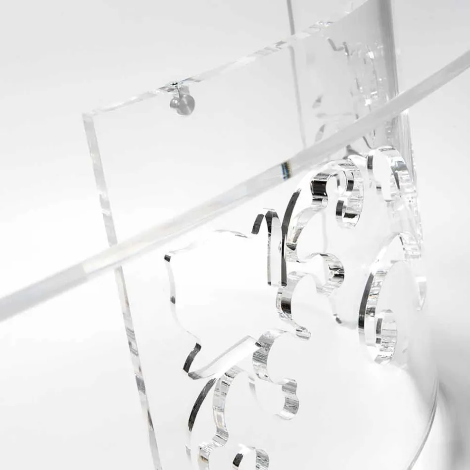 Stolik kawowy z wędzonej lub przezroczystej pleksi z dekorowaną podstawą - Crassus Viadurini