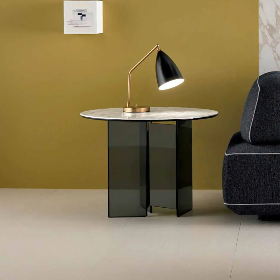 Stolik kawowy z przydymionym szkłem i okrągłym blatem ceramicznym - losowo Viadurini