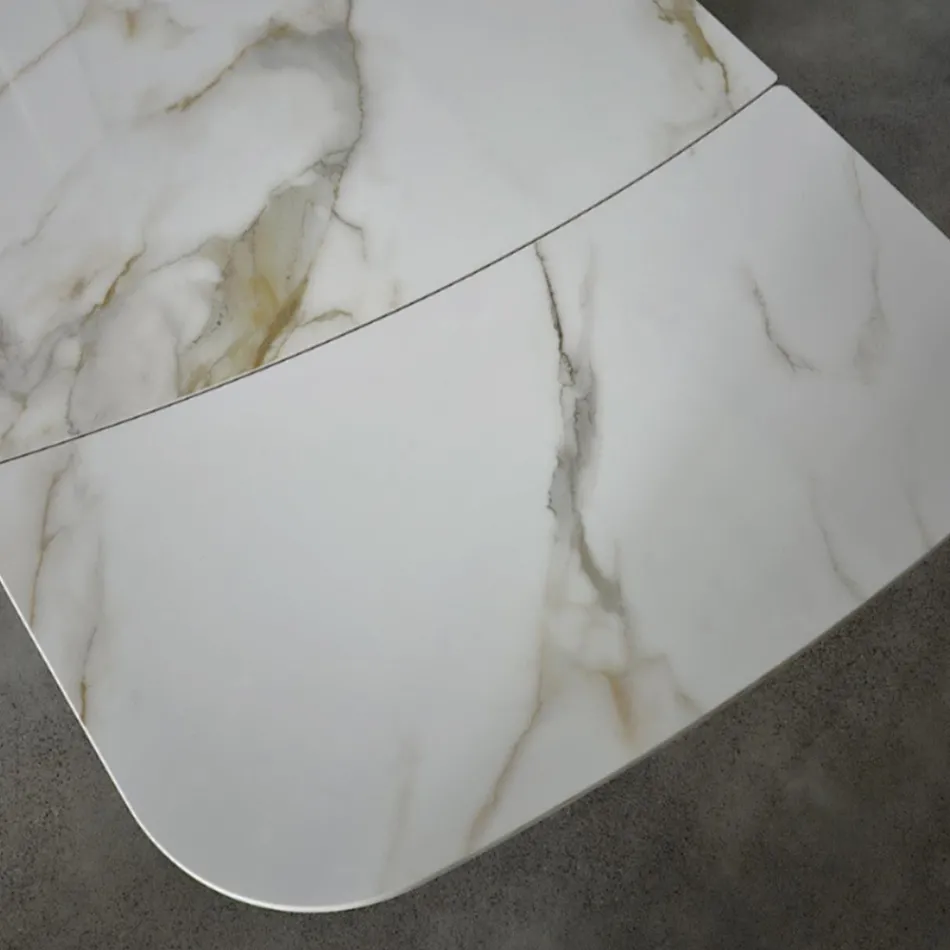 Rozkładany stół o długości od 180 do 260 cm z kamionki spiekanej z wykończeniem Calacatta - Vortex Viadurini