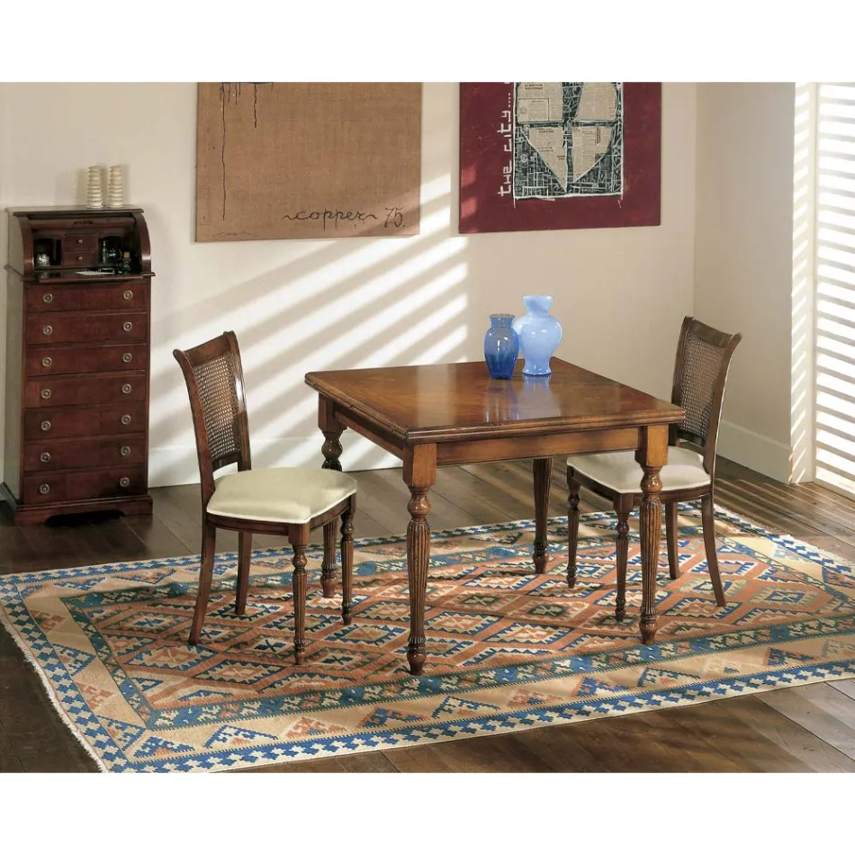 Rozkładany stół i 2 krzesła z patynowanego orzecha włoskiego Made in Italy - Biotite Viadurini