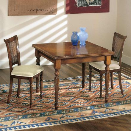 Rozkładany stół i 2 krzesła z patynowanego orzecha włoskiego Made in Italy - Biotite Viadurini