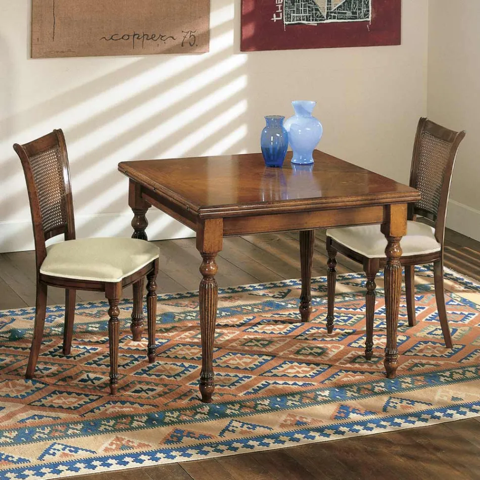 Rozkładany stół i 2 krzesła z patynowanego orzecha włoskiego Made in Italy - Biotite Viadurini