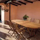 Rozkładany designerski stół ogrodowy do 200 cm owalny z drewna - Roxen Viadurini