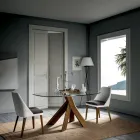 Stół do salonu ze szklanym blatem i drewnianymi nogami — botaniczny Viadurini