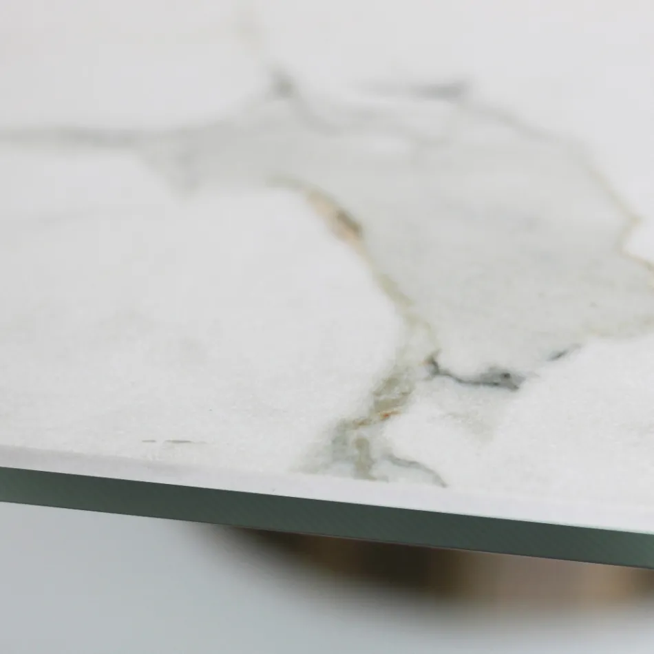 Stały stół ze stalową podstawą i ceramicznym blatem Made in Italy - Spodnie Viadurini