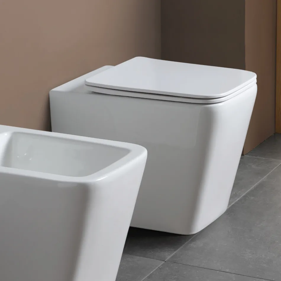 Toaleta podłogowa z wolnoopadającą ceramiczną deską sedesową i nowoczesnym designem - Giunco Viadurini