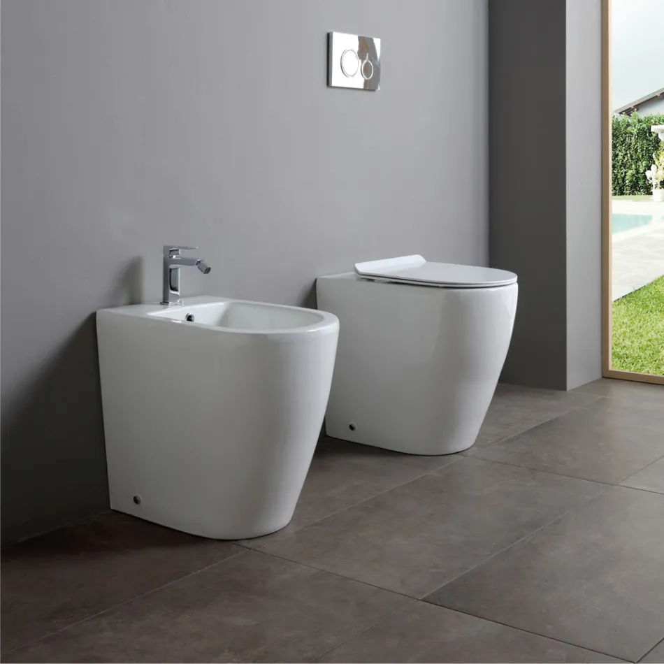 Toaleta ceramiczna Oleander z wysuwanym odpływem i wolnoopadającą deską sedesową Viadurini