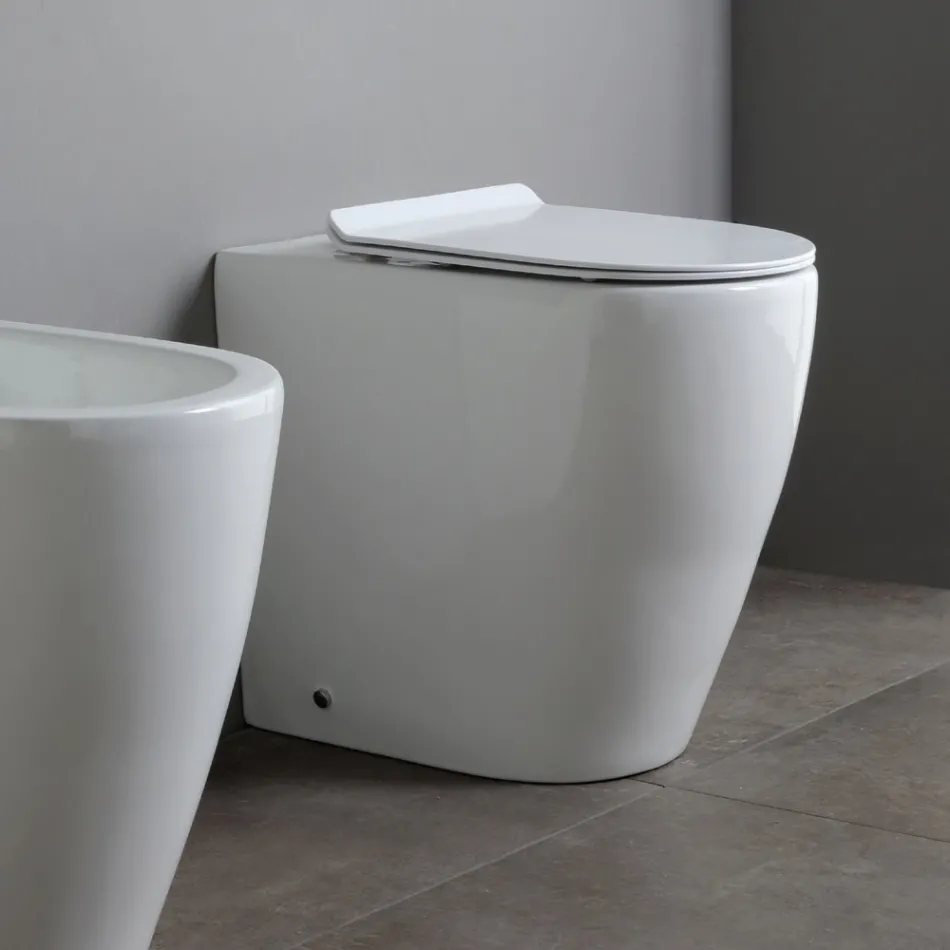 Toaleta ceramiczna Oleander z wysuwaną spłuczką i wolnoopadającym siedziskiem Viadurini