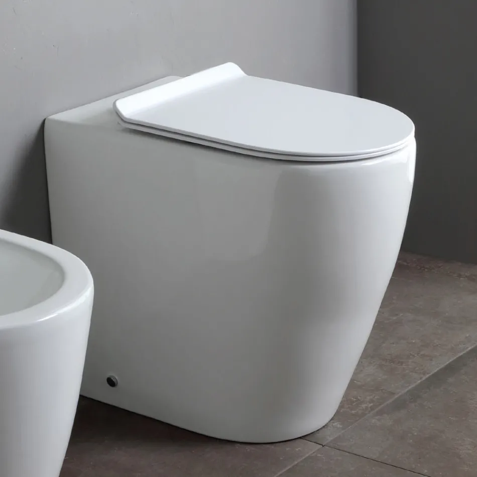 Toaleta bezrantowa z wolnoopadającą deską ceramiczną Thermoset - Oleander Viadurini