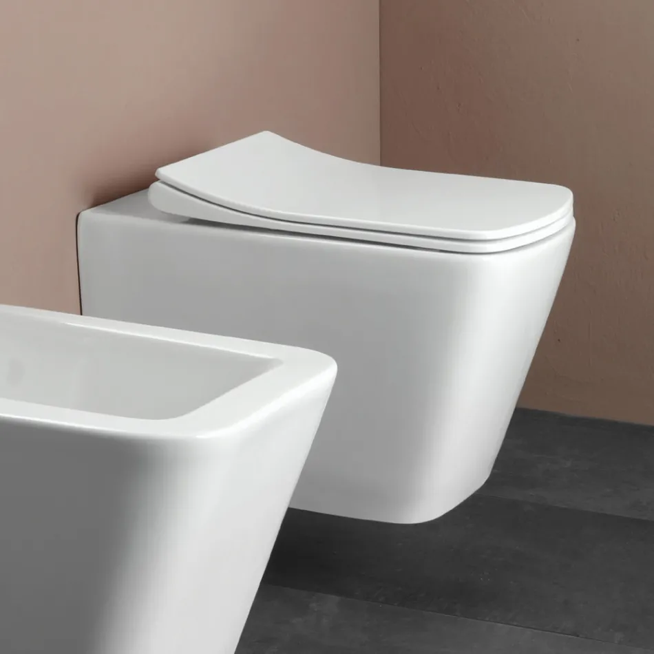 Podwieszana toaleta z wolnoopadającą ceramiczną deską sedesową w nowoczesnym designie - Giunco Viadurini