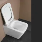 Podwieszana toaleta z wolnoopadającą ceramiczną deską sedesową w nowoczesnym designie - Giunco Viadurini