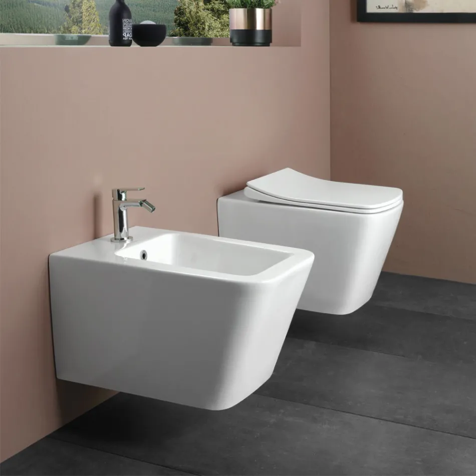 Podwieszana toaleta z wolnoopadającą ceramiczną deską sedesową w nowoczesnym designie - Giunco Viadurini