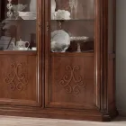 Drewniana witryna z patynowanym wykończeniem w kolorze orzecha z dekoracją w kształcie lilii Made in Italy - Women Viadurini